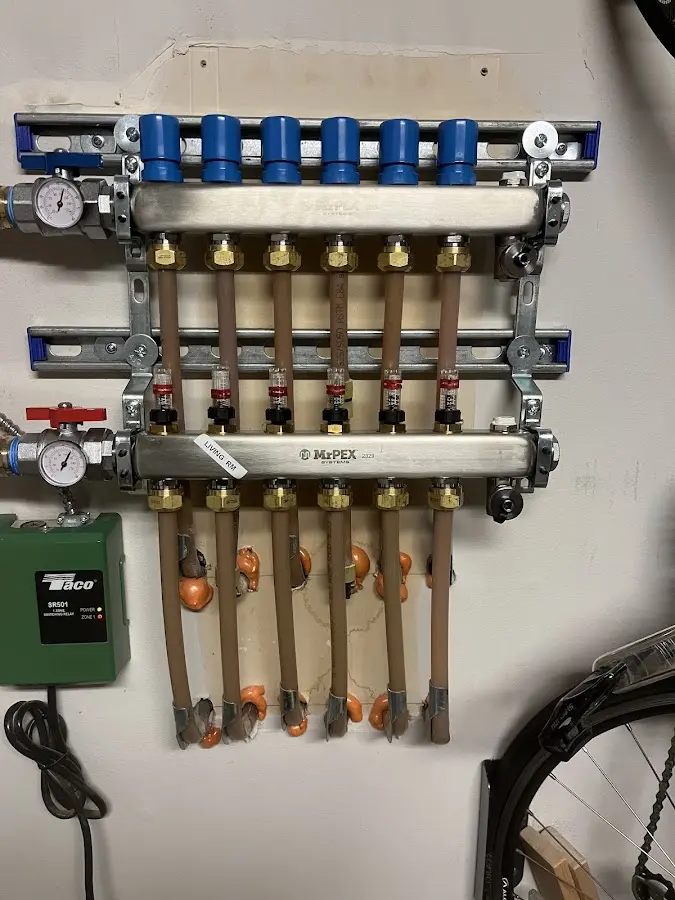 Plumber performing Water Heater Repair at a residential property in Posen